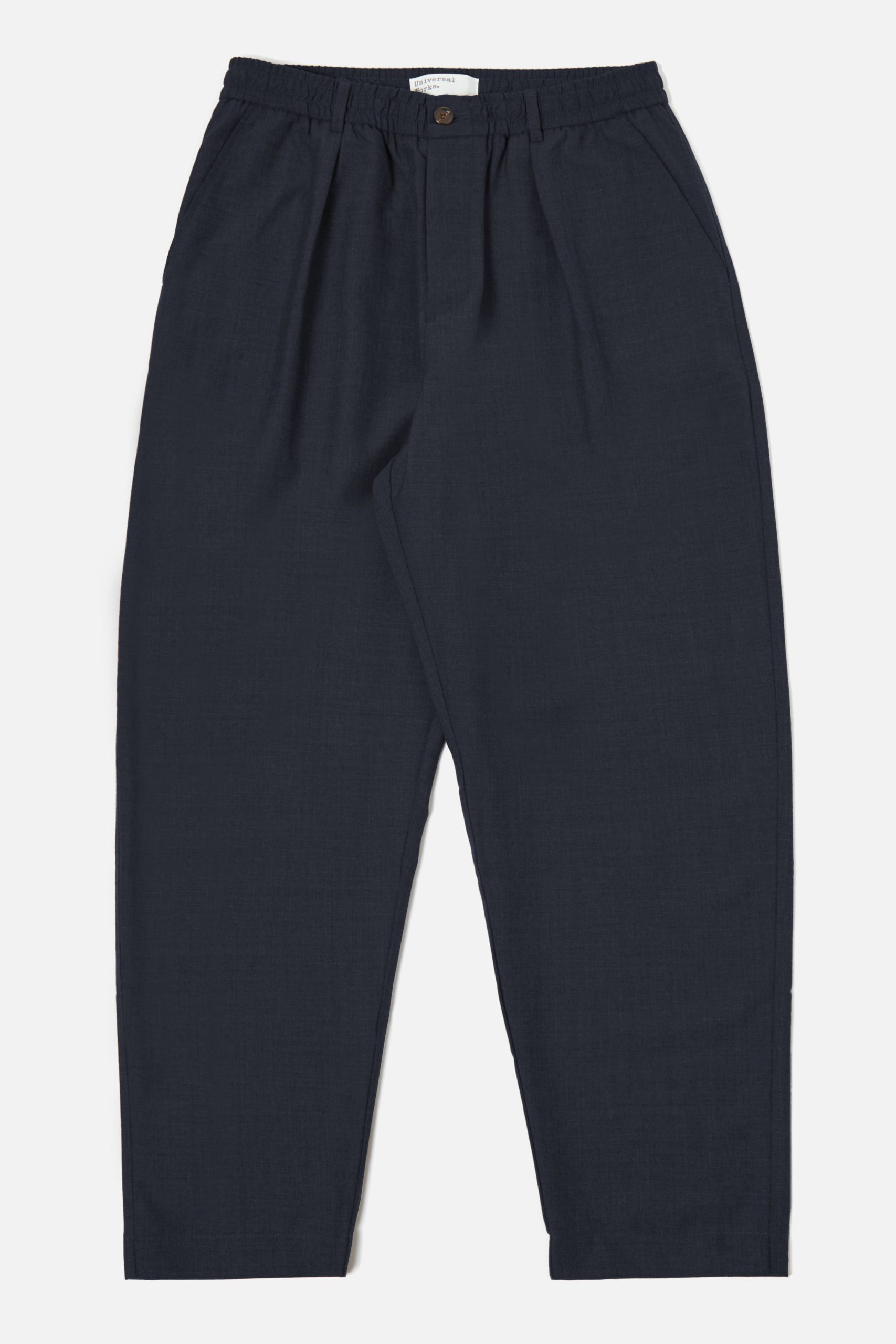 UNIVERSAL WORKS Pleated Track Pant In Navy Marl Tropical Suiting